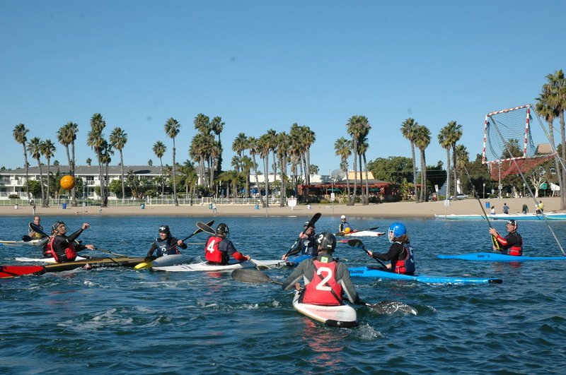 A group of kayakers huddle uo near the sandy shores of Marina Del Ray. With beaches and wildlife, Marina Del Ray is one of the most accessible places to kayak in Los Angeles.