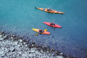 kayakers go paddling in the deep blue shoes