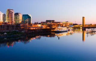 Sacramento skyline reflected in the Sacramento river - one of the most beautiful spots for kayaking in Sacramento